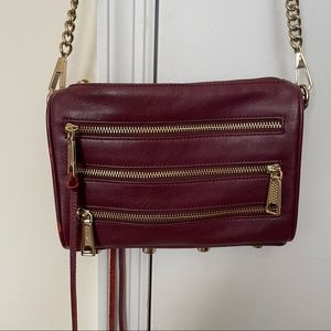 Rebecca Minkoff burgundy 5 zip crossbody bag